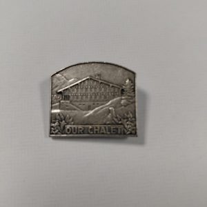 Our Chalet World Centre pin badge